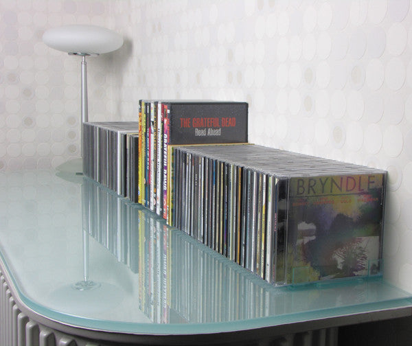CD rack on table top with interlocking DVD rack section.