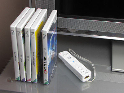Small DVD storage rack with video games.